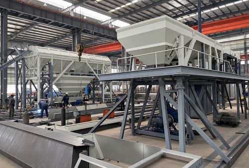 Temporary illustrative image of a concrete batching plant manufacturing factory exterior